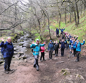 Hikers wave at the camera during the Staffordshire Moorlands Walking Festival